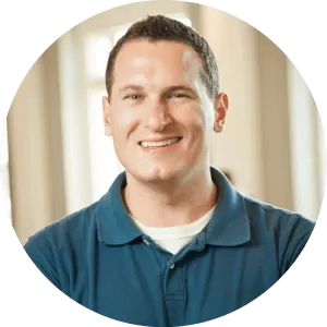 Jeff Sauer smiling in a professional photo